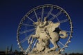 Statue of King of Fame riding Pegasus on the Place de la Concorde with ferris wheel at background, Paris, France Royalty Free Stock Photo