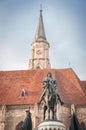 Statue of King Mathias in front of the church of Saint Michael