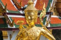 Statue of a kinnara in the temple of the Emerald Buddha, Wat Phra Kaew in Bangkok Thailand Royalty Free Stock Photo