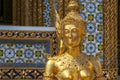 Statue of a kinnara in the temple of the Emerald Buddha, Wat Phra Kaew in Bangkok Thailand Royalty Free Stock Photo