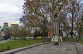 Statue of Kliment Ohridski in the city center on the background of the Golden domes of St. Alexander Nevsky Cathedral of Sofia