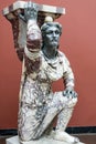 Statue of Kneeling Barbarian in pavonazzetto marble from Asia Minor