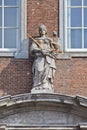 Statue Lady Justice on an ancient facade, Breda, Netherlands Royalty Free Stock Photo