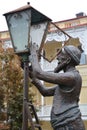 Statue of lamplighter on Baratashvili avenue. Royalty Free Stock Photo