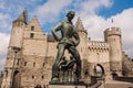 Statue of Lange Wapper in front of the castle in Antwerpen. Lange Wapper is a legend about a giant who irritates people, children