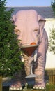 Statue of large pink elephant with martini in ID