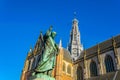 Statue of Laurens Janszoon Coster and Saint Bavo church in Haarlem, Netherlands Royalty Free Stock Photo