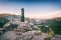 Statue of legendary Mila Gojsalic on top of a rocky mountain near Omis, Dalmatia, Croatia