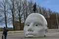 Above water, statue of Henk Hofstra in Lelystad