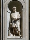The statue of Leonardo Da Vinci outside the Uffizi colonnade in Florence. Sculpted by Luigi Pampaloni, 1842 Royalty Free Stock Photo