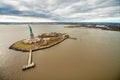 The Statue of Liberty aerial view from helicopter in winter season, New York City - USA Royalty Free Stock Photo