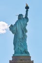 Statue of Liberty back view in New York in a sunny day Royalty Free Stock Photo