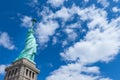 The Statue of Liberty with blue sky and cloud on a sunny day, New York City, USA