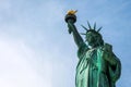 Statue of Liberty close up in a sunny day, blue sky in New York - Image Royalty Free Stock Photo