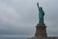 Statue of Liberty on a cloudy day. NY, USA. Royalty Free Stock Photo