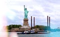 Statue of Liberty with colorful boat passing by