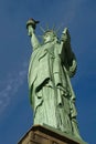 The Statue of Liberty is a colossal copper statue designed by Auguste Bartholdi a French sculptor was built by Gustave Eiffel Royalty Free Stock Photo