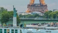 The Statue of Liberty and the Eiffel Tower day to night Timelapse with modern buildings. Paris, France Royalty Free Stock Photo