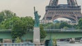 The Statue of Liberty and the Eiffel Tower Timelapse. Paris, France Royalty Free Stock Photo