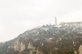 statue of liberty is high-mounted snow-covered mountain Gellerta shore Don shore ashtray. Hungary Budapest February 2018