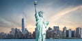 The Statue of Liberty with high-rise building in Lower Manhattan Royalty Free Stock Photo