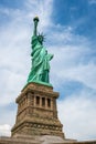 Statue of Liberty on Liberty Island closeup with blue sky in New York City Manhattan - Image Royalty Free Stock Photo