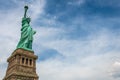 Statue of Liberty on Liberty Island closeup with blue sky in New York City Manhattan - Image Royalty Free Stock Photo