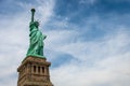 Statue of Liberty on Liberty Island closeup with blue sky in New York City Manhattan - Image Royalty Free Stock Photo