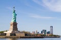 Statue of Liberty, and Manhattan Skyline behind it Royalty Free Stock Photo