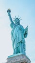 The Statue of Liberty, New York City on sunny blue sky. American symbol Royalty Free Stock Photo