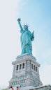 The Statue of Liberty, New York City on sunny blue sky. American symbol Royalty Free Stock Photo