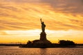 The Statue of Liberty at New York city during sunset Royalty Free Stock Photo