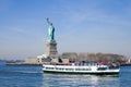 Statue of Liberty in NY Harbor with Circle Line Cruise boat