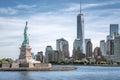 The Statue of Liberty with One World Trade Center background, Landmarks of New York City Royalty Free Stock Photo