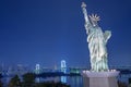 Statue of Liberty and Rainbow bridge at Odaiba Tokyo,Japan