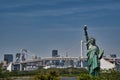 The Statue of Liberty and the Rainbow Bridge in Tokyo Bay. Tokyo Japan Royalty Free Stock Photo