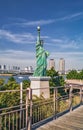 Statue of Liberty Replica near Rainbow Bridge in Odaiba, Tokyo Royalty Free Stock Photo