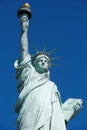 Statue of Liberty, sunlight and clear blue sky in New York Royalty Free Stock Photo