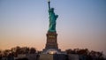 Statue of Liberty during sunset in the evening Royalty Free Stock Photo
