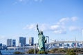 Statue of Liberty and Tokyo Skyscrapers view from Odaiba Royalty Free Stock Photo