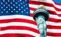 Statue of Liberty torch and US Flag Royalty Free Stock Photo