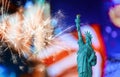 Statue of Liberty, United Stated flag Brooklyn Bridge background, New York, USA Royalty Free Stock Photo