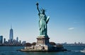 the statue of liberty with world trade center background, landmarks of new york city Royalty Free Stock Photo