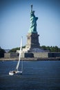 Statue of Liberty and yacht Royalty Free Stock Photo