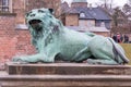 A statue of a lion, which guards the bridge over the moat leading to Rosenborg Castle Royalty Free Stock Photo