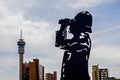 Constitutional Hill Precinct, Johannesburg, South Arfica. A man looking at Hillbrow Tower in Joburg. Metal statue of a man. Symbol Royalty Free Stock Photo