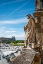 Statue looking down at the Square of Louvre Palace, Paris Royalty Free Stock Photo