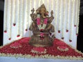 Statue of Lord Ganesha, decorated with flowers