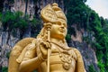 Statue of Lord Muragan and entrance at Batu Caves in Kuala Lumpur, Malaysia Royalty Free Stock Photo