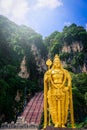 Statue of Lord Muragan and entrance at Batu Caves in Kuala Lumpur, Malaysia. Royalty Free Stock Photo